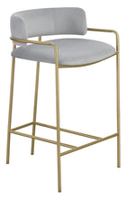 Load image into Gallery viewer, Comstock Upholstered Low Back Stool Grey and Gold