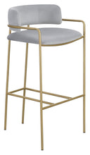 Load image into Gallery viewer, Comstock Upholstered Low Back Stool Grey and Gold