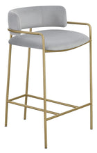 Load image into Gallery viewer, Comstock Upholstered Low Back Stool Grey and Gold